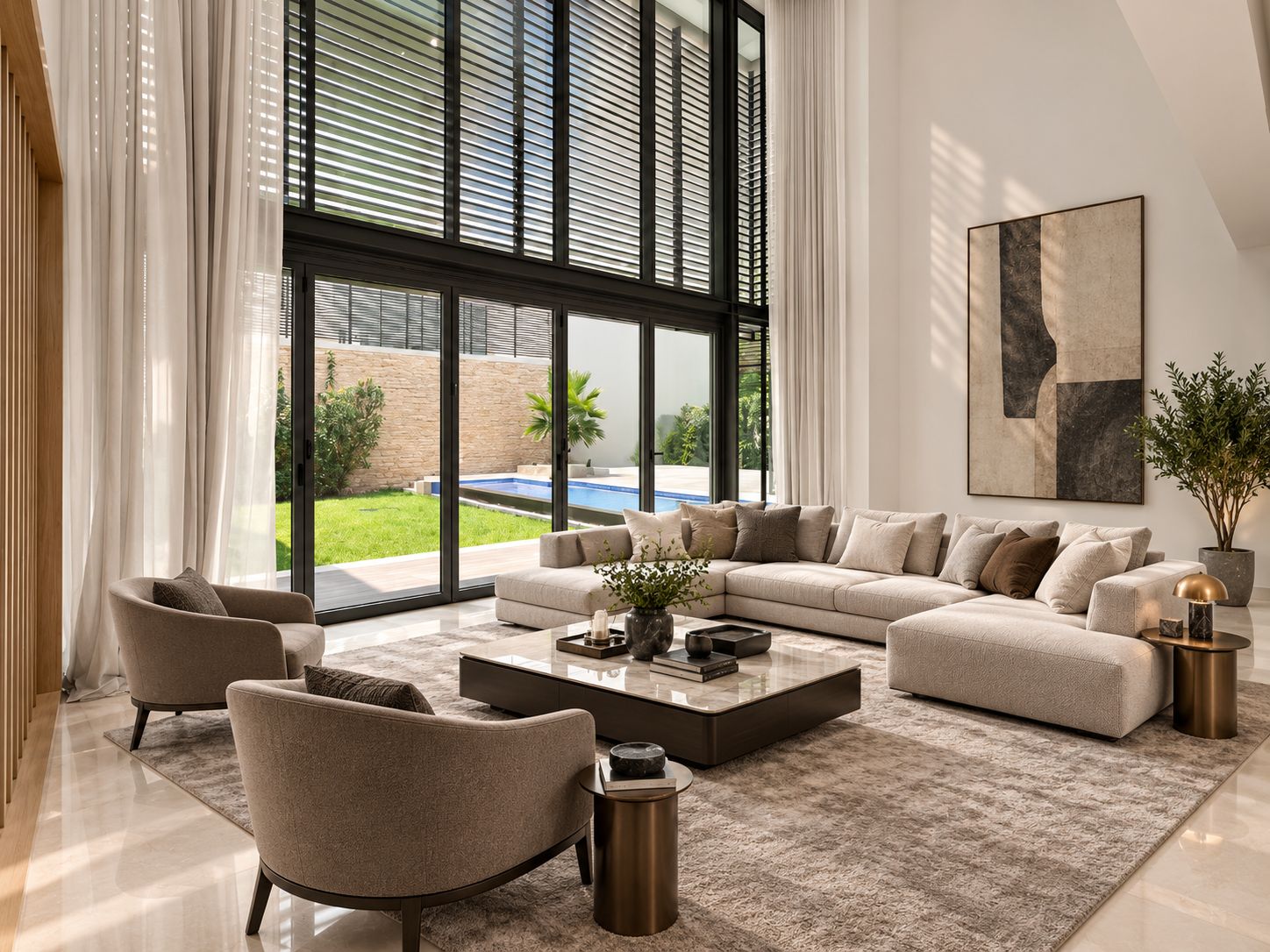 Completed living room with a cream sectional sofa, armchairs and a view onto the garden